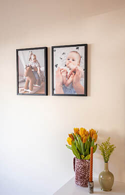 Two frames over a dresser