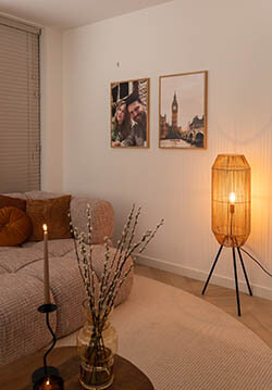 Two frames above the sofa